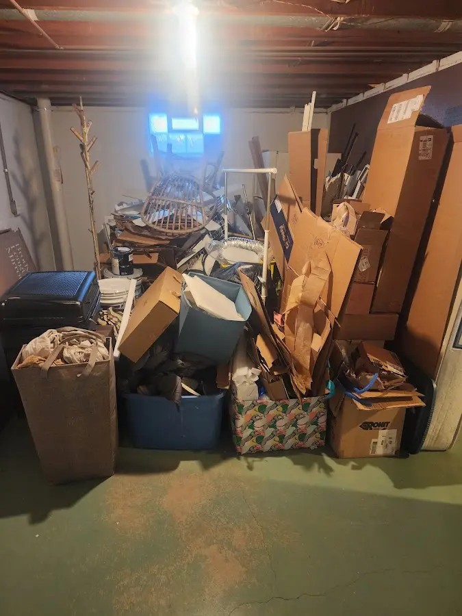 Roll-off dumpster container at job site for 4 Yard Dumpster Rental in Babylon